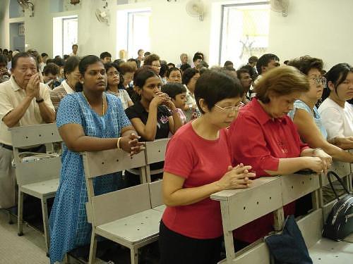 kneeling_at_church